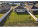 Aerial view of house and backyard, showcasing the community at 815 Sky Haven Way, New Smyrna Beach, FL 32168
