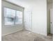 Bright bedroom with window blinds, carpet, and neutral walls at 815 Sky Haven Way, New Smyrna Beach, FL 32168