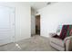 Spacious bedroom with neutral wall tones and plush carpet at 815 Sky Haven Way, New Smyrna Beach, FL 32168