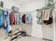 Large walk-in closet with double hanging rods and shelving at 815 Sky Haven Way, New Smyrna Beach, FL 32168