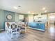 Open concept dining area, kitchen, and living room at 815 Sky Haven Way, New Smyrna Beach, FL 32168