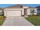 One-story home with attached garage and well-manicured lawn at 815 Sky Haven Way, New Smyrna Beach, FL 32168