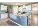 Modern kitchen with stainless steel appliances and granite countertops at 815 Sky Haven Way, New Smyrna Beach, FL 32168
