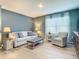 Relaxing living room with comfortable seating and natural light at 815 Sky Haven Way, New Smyrna Beach, FL 32168