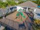 Community playground with playset and shaded seating at 815 Sky Haven Way, New Smyrna Beach, FL 32168