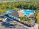 Community pool, pickleball courts, playground, and parking at 815 Sky Haven Way, New Smyrna Beach, FL 32168