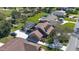 An aerial view of the home and property from the street at 839 Fairway Dr, New Smyrna Beach, FL 32168