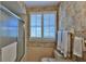 Well-lit bathroom with a shower, toilet, and granite countertop at 839 Fairway Dr, New Smyrna Beach, FL 32168