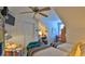 ' bedroom featuring two twin beds, a ceiling fan, and colorful accents at 839 Fairway Dr, New Smyrna Beach, FL 32168