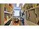 Organized craft room with ample storage, workspace, and natural light at 839 Fairway Dr, New Smyrna Beach, FL 32168
