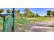 Golf course view of the 16th hole, a par 4 at 839 Fairway Dr, New Smyrna Beach, FL 32168