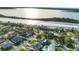 Aerial view of waterfront homes and neighborhood at 142 Sandpiper Ridge Dr, Ormond Beach, FL 32176