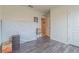 Small bedroom with wood flooring and ample storage at 1911 Hollybrooke Rd, Edgewater, FL 32141