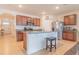 Modern kitchen with island, stainless steel appliances, and granite countertops at 1911 Hollybrooke Rd, Edgewater, FL 32141