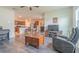 Living room with hardwood floors and comfortable seating at 1911 Hollybrooke Rd, Edgewater, FL 32141