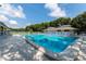 Refreshing community pool with lounge chairs at 4325 Sea Mist Dr # 248, New Smyrna Beach, FL 32169