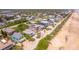 Aerial view of beachfront homes and properties, showcasing ocean views and community at 6368 S Atlantic Ave, New Smyrna Beach, FL 32169