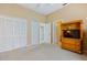 Bedroom featuring a large closet and neutral color scheme at 6368 S Atlantic Ave, New Smyrna Beach, FL 32169