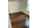 Bedroom with wood-look floors and window with blinds at 827 Camargo Way # 307, Altamonte Springs, FL 32714