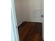 Spacious walk-in closet with wood-look flooring at 827 Camargo Way # 307, Altamonte Springs, FL 32714