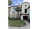 Condo building entrance with stairs and landscaping at 827 Camargo Way # 307, Altamonte Springs, FL 32714