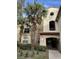 Condo building entrance with stairs and landscaping at 827 Camargo Way # 307, Altamonte Springs, FL 32714
