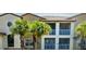 Two-story condo building with palm trees and balconies at 827 Camargo Way # 307, Altamonte Springs, FL 32714