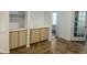 Kitchen with built-in cabinets and tiled floor at 827 Camargo Way # 307, Altamonte Springs, FL 32714