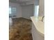 Open living area with tile floors and French doors at 827 Camargo Way # 307, Altamonte Springs, FL 32714
