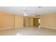 Living room with tile floors and neutral walls at 5025 E Lake Mary Blvd, Sanford, FL 32771