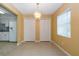 Dining area with tile floor and chandelier at 5025 E Lake Mary Blvd, Sanford, FL 32771