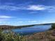 Serene view of a calm river under a clear sky at 5025 E Lake Mary Blvd, Sanford, FL 32771