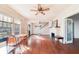 Spacious living room featuring hardwood floors and a fireplace at 415 Braddock Ave, Daytona Beach, FL 32118