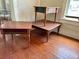 Set of three vintage end tables with wood and green accents at 415 Braddock Ave, Daytona Beach, FL 32118