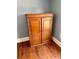 Free-standing wooden cabinet with double doors at 415 Braddock Ave, Daytona Beach, FL 32118