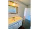 Simple bathroom with a sink and vanity cabinet at 415 Braddock Ave, Daytona Beach, FL 32118