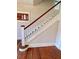 White wooden staircase with a simple design at 415 Braddock Ave, Daytona Beach, FL 32118
