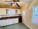 White kitchen cabinets and tiled floor at 415 Braddock Ave, Daytona Beach, FL 32118