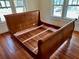 Wooden sleigh bed frame with wood slats at 415 Braddock Ave, Daytona Beach, FL 32118