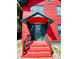 Front entrance with green door and brick steps at 415 Braddock Ave, Daytona Beach, FL 32118
