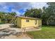 Another side view of the house and yard at 14650 Liberty St, Orlando, FL 32826