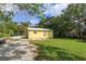 Cute yellow house with a spacious backyard at 14650 Liberty St, Orlando, FL 32826