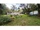 Multiple structures and overgrown yard at 770 Snow Hill Rd, Geneva, FL 32732