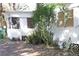 White shed and mobile home with green plants at 770 Snow Hill Rd, Geneva, FL 32732