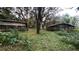 Several wooden animal enclosures in a yard at 770 Snow Hill Rd, Geneva, FL 32732