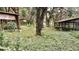 Several wooden animal enclosures in a yard at 770 Snow Hill Rd, Geneva, FL 32732