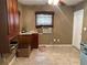 Kitchen with wood cabinets and a window at 1023 W Gore W St, Orlando, FL 32805