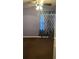 Bedroom with brown carpet and patterned curtains at 1023 W Gore W St, Orlando, FL 32805