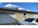 White garage door with a car parked in front at 1023 W Gore W St, Orlando, FL 32805