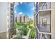 Complex with lush landscaping and a central courtyard at 14501 Grove Resort Ave # 1430, Winter Garden, FL 34787